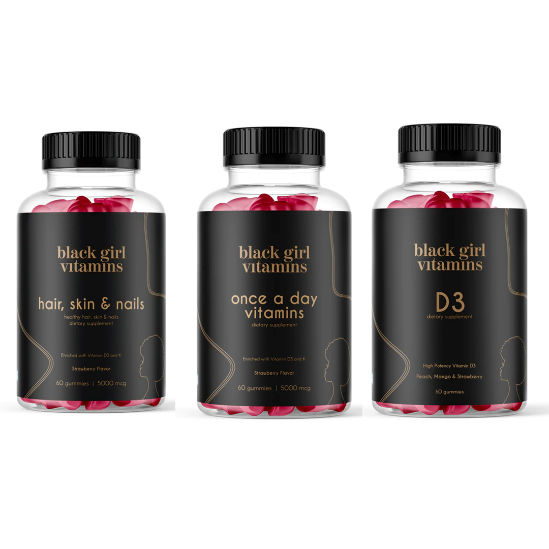 Three Black Girl Vitamins bottles: Hair, Skin & Nails with Strawberry Flavor; Once a Day Vitamins with Strawberry Flavor; D3 with Peach, Mango & Strawberry flavors.