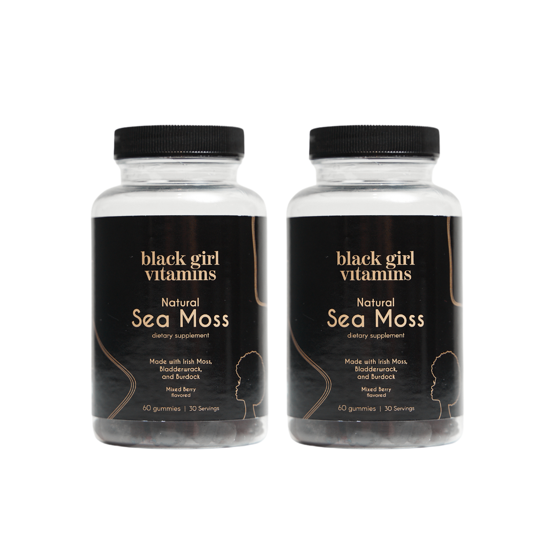 Two bottles of Black Girl Vitamins Natural Sea Moss dietary supplement gummies